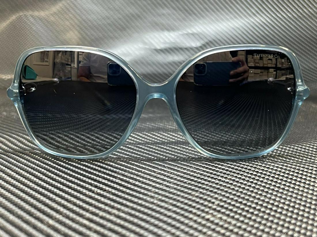 TIFFANY TF4145B 82444L Blue Grey/Blue Gradient Women's Sunglasses 57 mm: TIFFANY TF4145B 82444L Blue Grey/Blue Gradient Women's Sunglasses 57 mm Brand: Tiffany & Co. Type: Sunglasses Frame Color: Silver New The Mynt Guarantee: All items in this auction are guaranteed authe