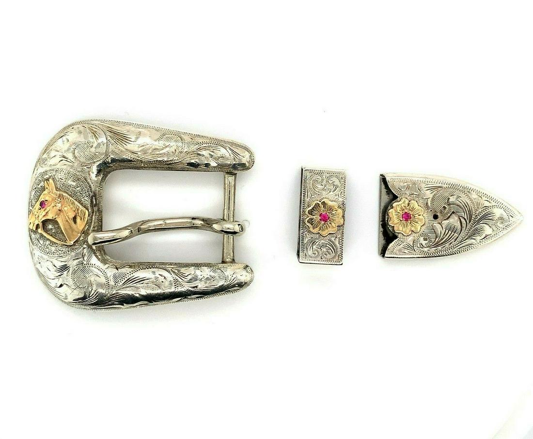 Sterling Belt Bucklet Set 3pc with 10k Yellow Gold Horse: Sterling Belt Bucklet Set 3pc with 10k Yellow Gold Horse Base Metal: Sterling Silver Material: Metal Type: Belt Buckle Set Color: Multicolor Signed: Yes Main Stone: Synthetic Ruby Brand: John McCabe
