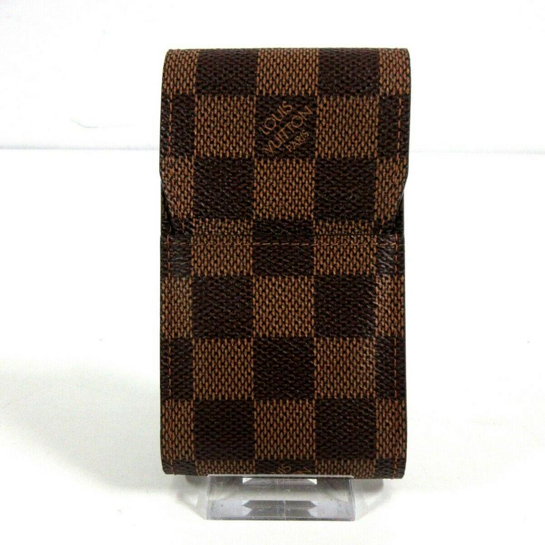 LOUIS VUITTON Etui Cigarette N63024 Ebene Damier CT1025 Cigarette Case: LOUIS VUITTON Etui Cigarette N63024 Ebene Damier CT1025 Cigarette Case Brand: LOUIS VUITTON Style: Accessory Case Exterior Color: Ebene Exterior Material: Damier Canvas Model Number: N63024 Product Na