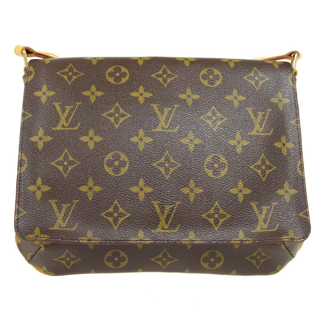 LOUIS VUITTON MUSETTE TANGO SHORT SHOULDER BAG SD0033 MONOGRAM M51257: LOUIS VUITTON MUSETTE TANGO SHORT SHOULDER BAG SD0033 MONOGRAM M51257 Size: Medium Accents: Logo Model: Monogram Style: Shoulder Bag Handle Style: Shoulder Strap Bag Height: 8.5 Product Line: LOUIS VU