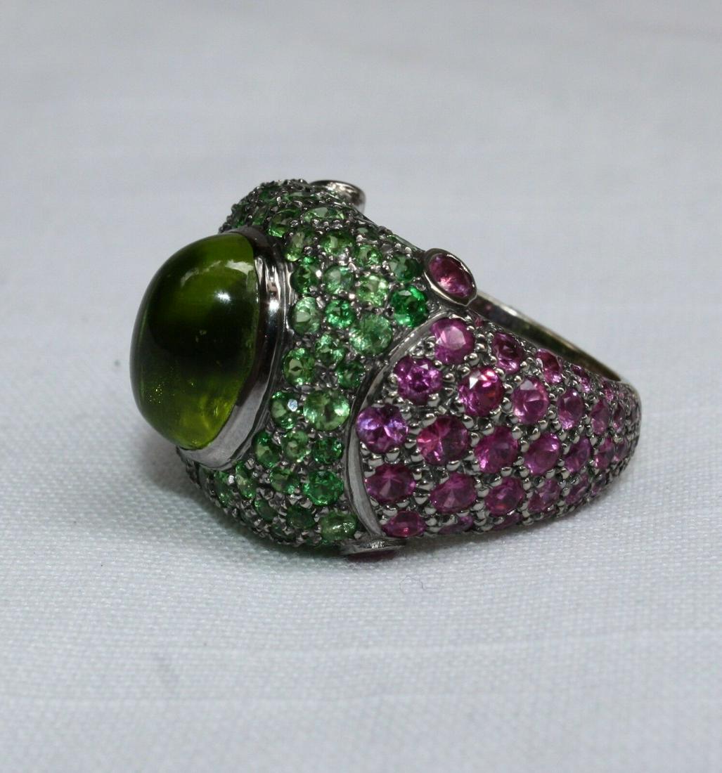 FRENCH 18K W GOLD PINK SAPPHIRE GARNET PERIDOT CABOSHON CENTER STONE RING 7: FRENCH 18K W GOLD PINK SAPPHIRE GARNET PERIDOT CABOSHON CENTER STONE RING 7 Metal Purity: 18k Main Stone: Peridot Garnet Saphire Caboshon Sizable: Yes Metal: White Gold Ring Size: 7 Type: Ring Materia
