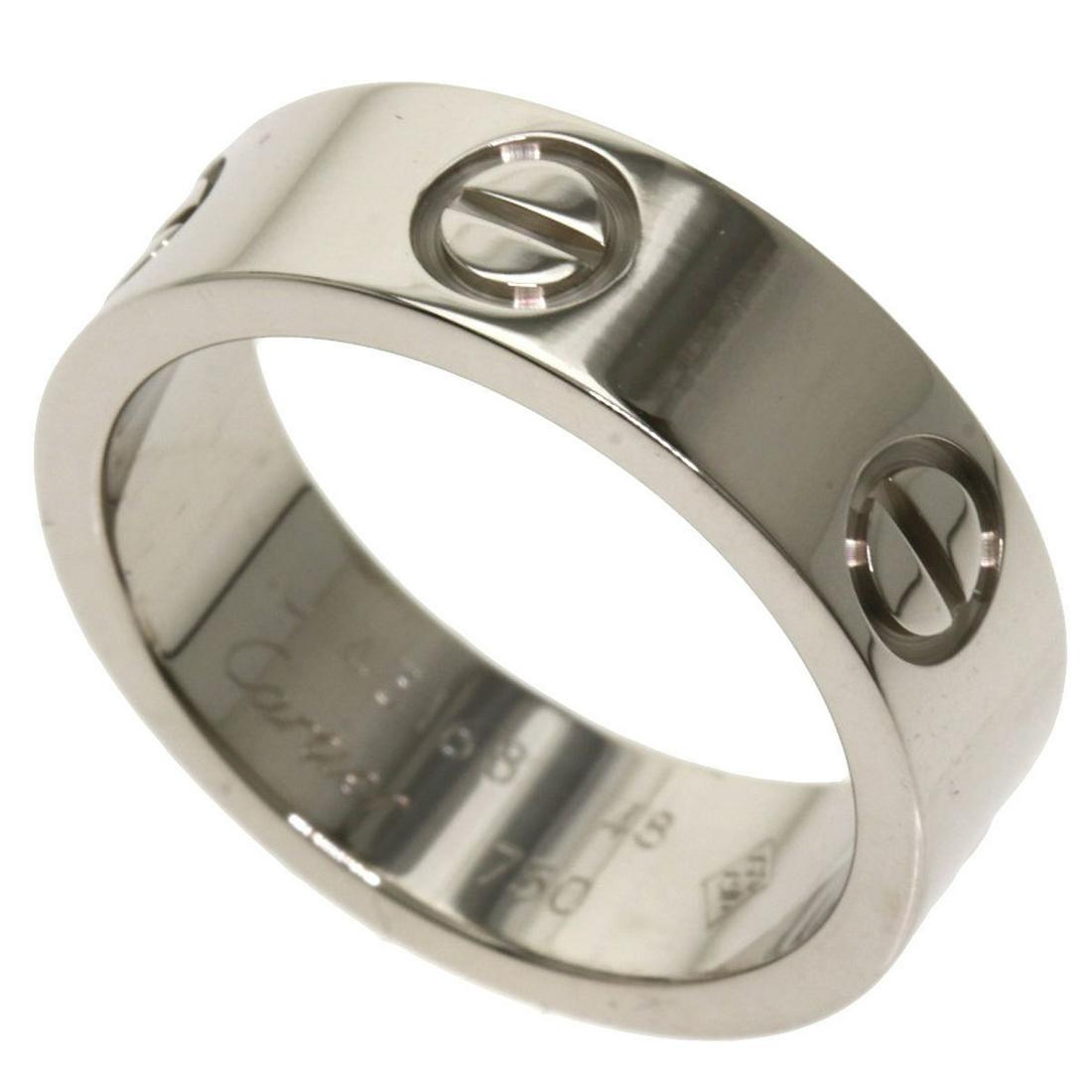 Cartier Love Ring # 48 / K18 White Gold Ladies CARTIER: Cartier Love Ring # 48 / K18 White Gold Ladies CARTIER Brand: Cartier Line: Love Gender: Women Color: White gold Material: White gold (18K) US Size: 4.5-5 Other Size: 48 Width: 5.4mm / 0.21 Weight: 6.