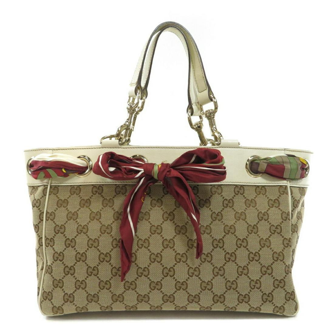 Gucci 162879 GG Positano Tote Bag Canvas Leather Ladies: Gucci 162879 GG Positano Tote Bag Canvas Leather Ladies Brand: Gucci Model: 162879 GG Type: Tote bag Material: Canvas Canvas: Color: Beige White Closure: Open Outer Pocket: Zipper pocket Zipper pocket