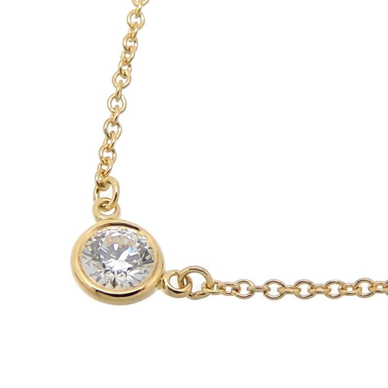 Tiffany 750YG by the Yard Diamond Ladies Necklace 750 Yellow Gold: Tiffany 750YG by the Yard Diamond Ladies Necklace 750 Yellow Gold Brand: Tiffany Necklace Type: Pendant necklace Gender: Women Material: Yellow gold (18K) Color: Yellow gold Stone: Diamond Weight: 1.9