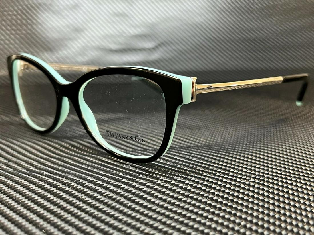 Tiffany TF2190 8055 Black Blue Women Butterfly Demo Lens Eyeglasses Frame: Tiffany TF2190 8055 Black Blue Women Butterfly Demo Lens Eyeglasses Frame Brand: Tiffany & Co. Department: Women Frame Color: Black Blue Type: Eyeglasses Lens Socket Width: 54 mm Bridge Width: 17 mm T