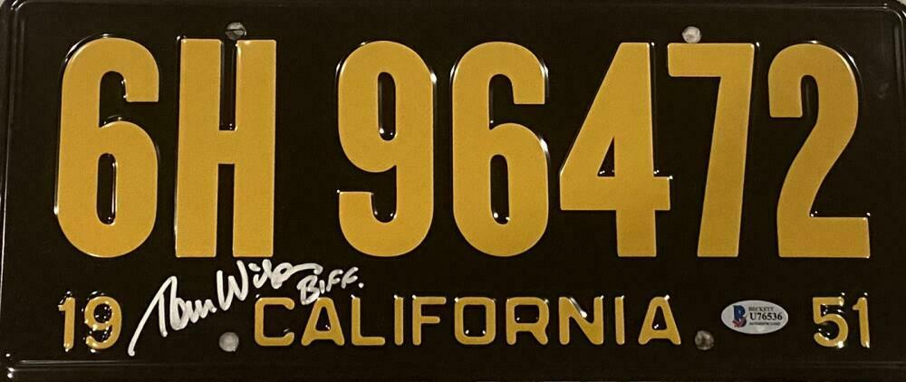 Tom Wilson Authentic Autographed BTTF License Plate: Tom Wilson Authentic Autographed BTTF License Plate Signature: Tom Wilson Product: Autographed License Plate Inscription: BIFF Featured Movie: Back to the Future Certificate of Authenticity: Beckett H