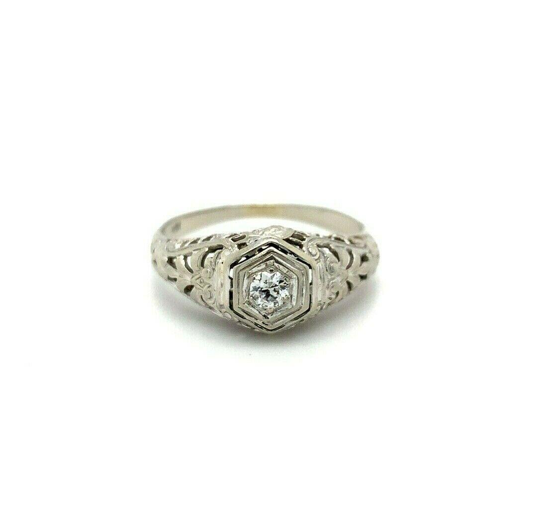 18k White Gold Art Deco Genuine Natural Diamond Filigree Ring: 18k White Gold Art Deco Genuine Natural Diamond Filigree Ring Total Carat Weight: 0.24 ctw & Under Department: Women Base Metal: White Gold Certification: GIA Material: Metal Number Of Gemstones: 1 Ty