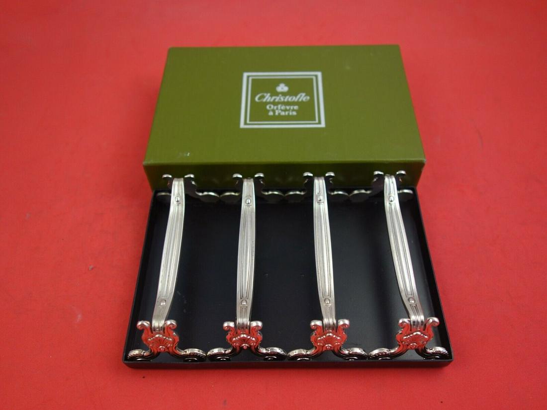 Vendome by Christofle Silverplate Knife Rests Never Used Set of 4 in: Vendome by Christofle Silverplate Knife Rests Never Used Set of 4 in Composition: Silverplate Age: 1900-1940 Brand: Christofle Pattern: Vendome Type: Flatware - Knives Featured Refinements: Silver Pla