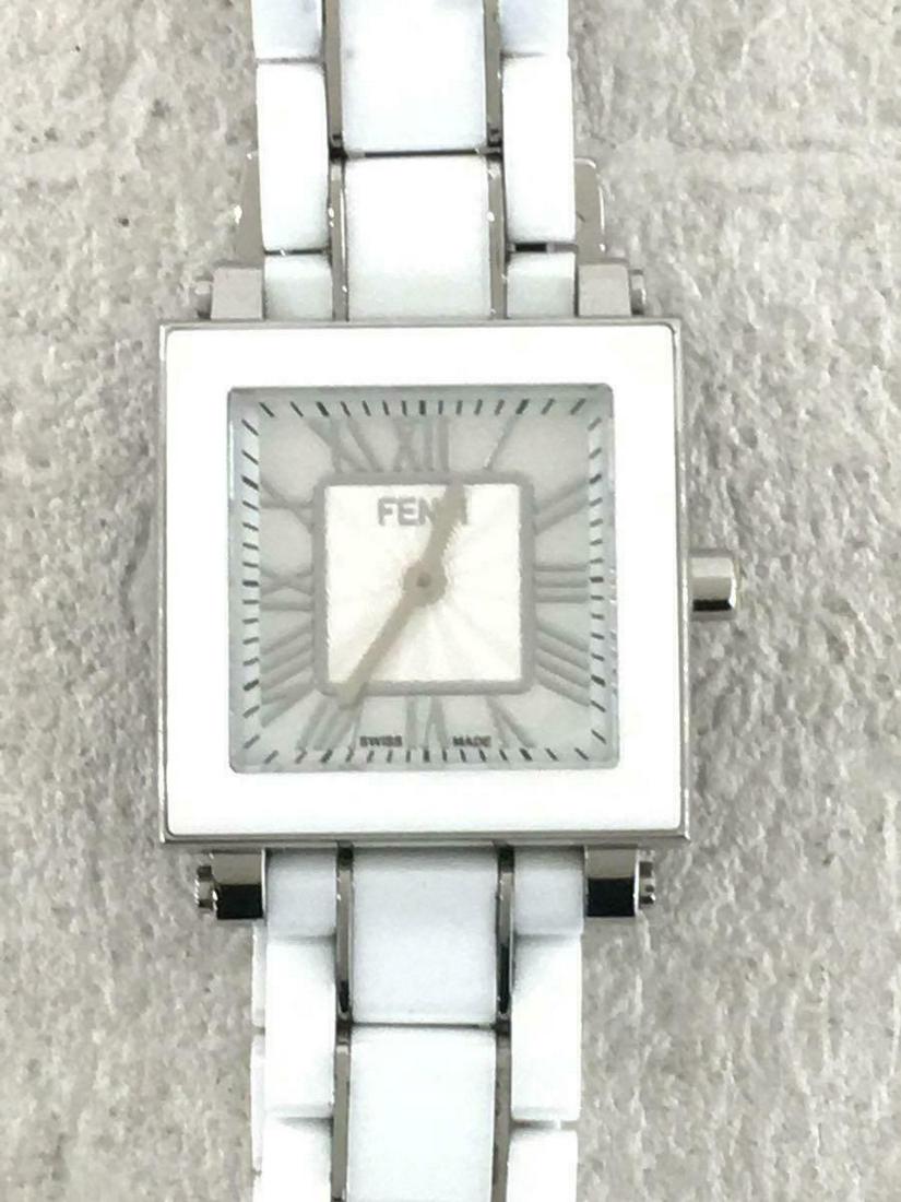 FENDI White Shell Dial Quadro Quartz Analog Ceramic White Ladies Watch: FENDI White Shell Dial Quadro Quartz Analog Ceramic White Ladies Watch Brand: Fendi Type: Wristwatch Pre-Owned The Mynt Guarantee: All items in this auction are guaranteed authentic and come with a 10