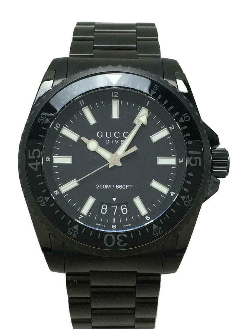 GUCCI Dive Quartz Analog Water Resistant Men's Watch Pre Owned: GUCCI Dive Quartz Analog Water Resistant Men's Watch Pre Owned Brand: Gucci Type: Wristwatch Pre-Owned The BIDHAUS Guarantee: All items in this auction are guaranteed to be 100% authentic. At Your Ser