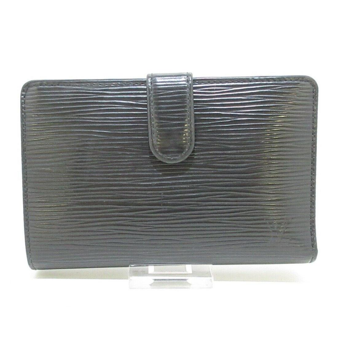 LOUIS VUITTON Porte Monnaie Billets Viennois M63272 Noir Epi Bifold Wallet: LOUIS VUITTON Porte Monnaie Billets Viennois M63272 Noir Epi Bifold Wallet Brand: LOUIS VUITTON Style: Bifold Wallet Color: Noir Material: Leather Model Number: M63272 Product Name: Porte Monnaie Bill