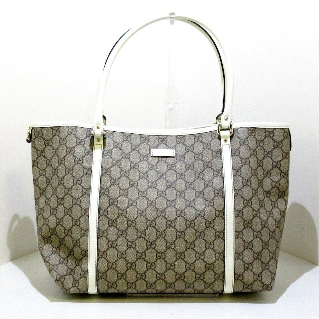 GUCCI GG Plus GG Supreme 197953 Beige Brown White PVC Leather Tote Bag: GUCCI GG Plus GG Supreme 197953 Beige Brown White PVC Leather Tote Bag Brand: GUCCI Style: Tote Bag Exterior Color: Beige Dark Brown White Exterior Material: PVC Leather Model Number: 197953 Product N