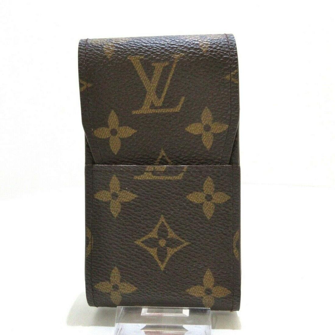 LOUIS VUITTON Etui Cigarette M63024 Monogram CT0958 Cigarette Case: LOUIS VUITTON Etui Cigarette M63024 Monogram CT0958 Cigarette Case Brand: LOUIS VUITTON Style: Accessory Case Exterior Color: Monogram Exterior Material: Monogram Canvas Model Number: M63024 Product N
