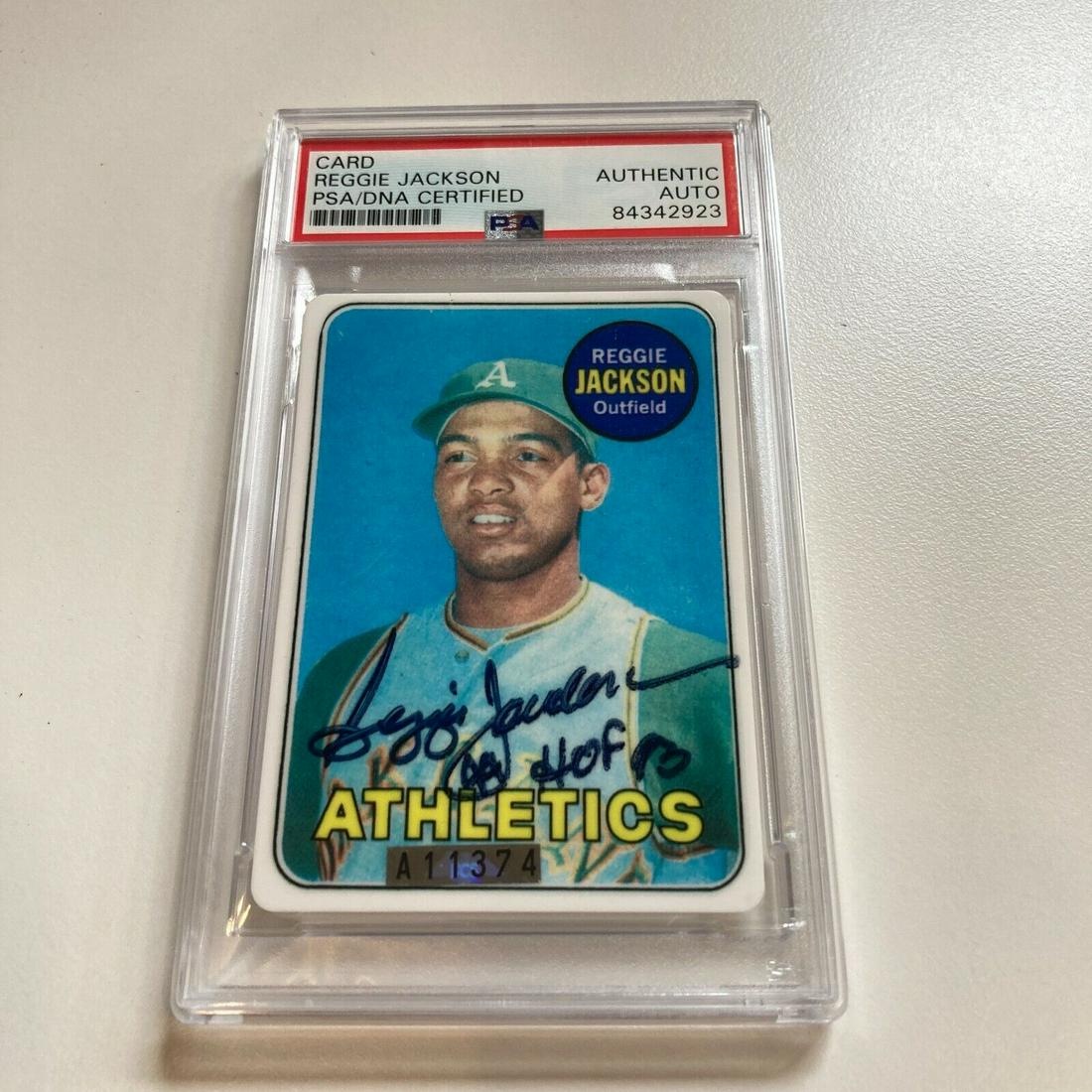 1969 Topps Reggie Jackson RC HOF 1990 Signed Porcelain Baseball Card PSA DNA: 1969 Topps Reggie Jackson RC HOF 1990 Signed Porcelain Baseball Card PSA DNA Graded: No Type: Sports Trading Card Manufacturer: Topps Sport: Baseball Autograph Format: Hard Signed Autograph Authentica