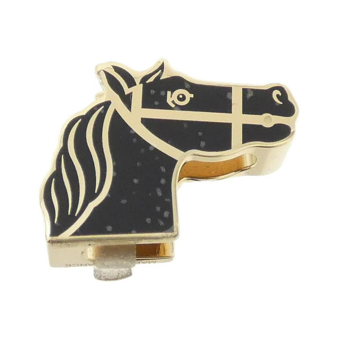 HERMES Quadrige 603222S Scarf Ring: HERMES Quadrige 603222S Scarf Ring Brand: HERMES Style: Scarf ring Color: LAQUE BLACK PERMA BRASS(GOLD) Gender: Unisex Size: W x H 3cmx0.6cm Type: Scarf ring A: Excellent The Mynt Guarantee: All items