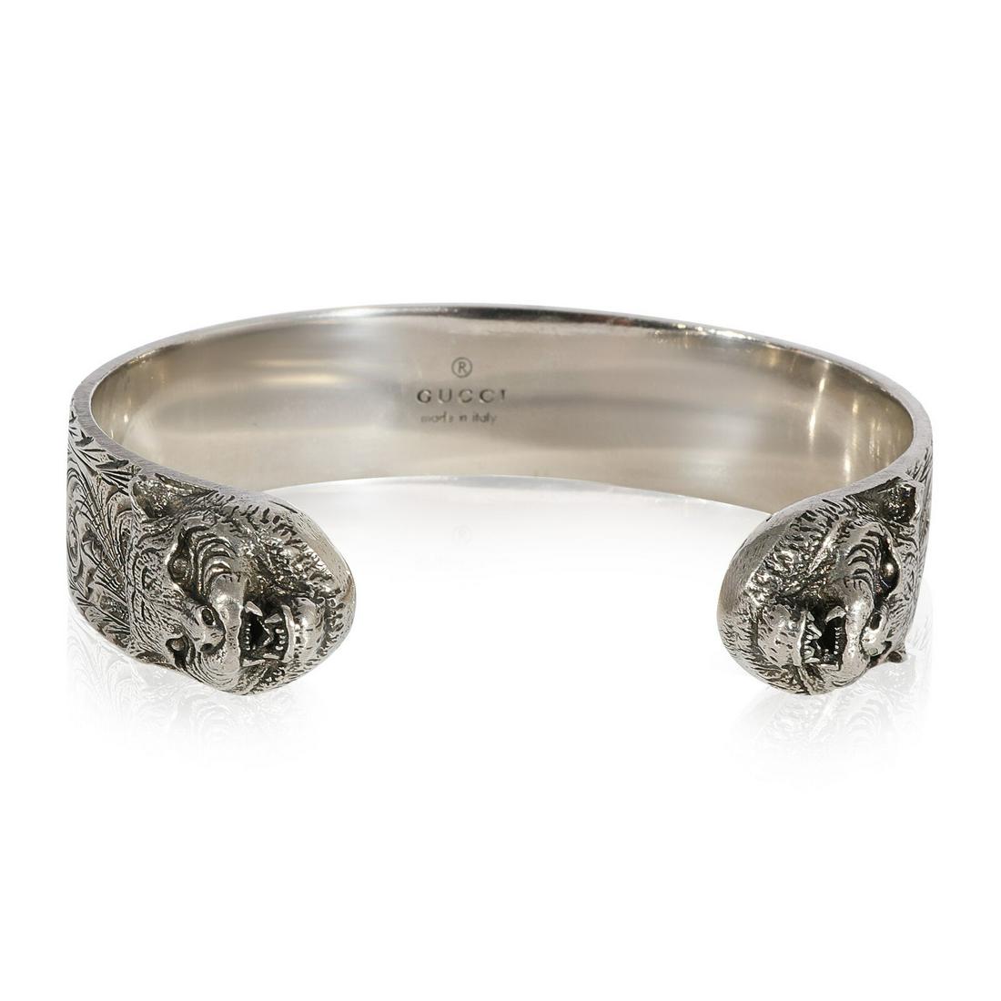 Gucci Gatto GG Cuff Bangle with Feline Head in 925 Sterling Silver: Gucci Gatto GG Cuff Bangle with Feline Head in 925 Sterling Silver Original Box?: Yes Metal Purity: 925 Original Papers?: No Gross Weight (Grams): 49.20 Type: Bracelet Includes: Box;Pouch Style: Brace