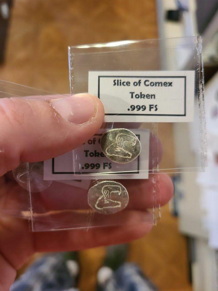 SLICE OF COMEX - Token OZT 999 FINE SILVER: SLICE OF COMEX - Token OZT 999 FINE SILVER Type: Industrial Silver Composition: Silver Certification: Uncertified Pre-Owned The MYNT Guarantee: All items in this auction are guaranteed to be 100% auth