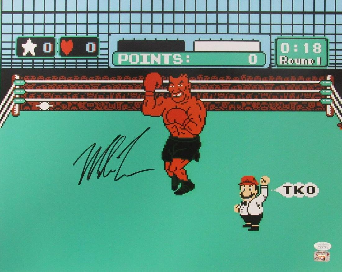 Mike Tyson Autographed/Signed 16x20 Nintendo "Punch Out" Photo JSA 154602: Mike Tyson Autographed/Signed 16x20 Nintendo "Punch Out" Photo JSA 154602 Sport: Boxing Product: Photo Original/Reprint: Original Autograph Authentication: JSA Pre-Owned PLEASE NOTE: Framed Large or h