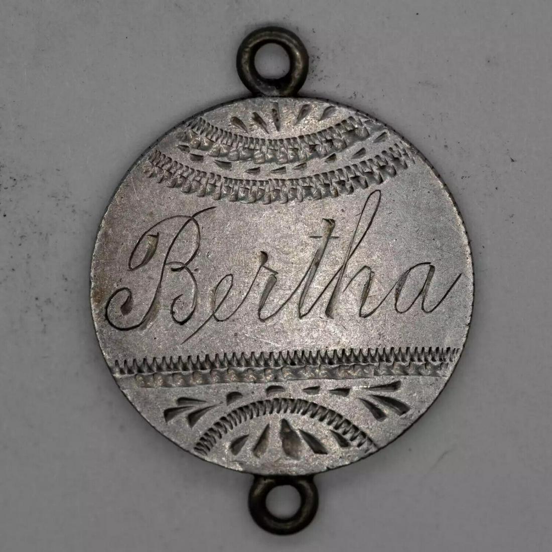 1875 SEATED LIBERTY DIME 10C SILVER - LOVE TOKEN "BERTHA" W/ 2 BAILS (4527): 1875 SEATED LIBERTY DIME 10C SILVER - LOVE TOKEN "BERTHA" W/ 2 BAILS (4527) Certification: Uncertified Composition: Silver Year: 1875 Circulated/Uncirculated: Unknown Strike Type: No Grade Country: US