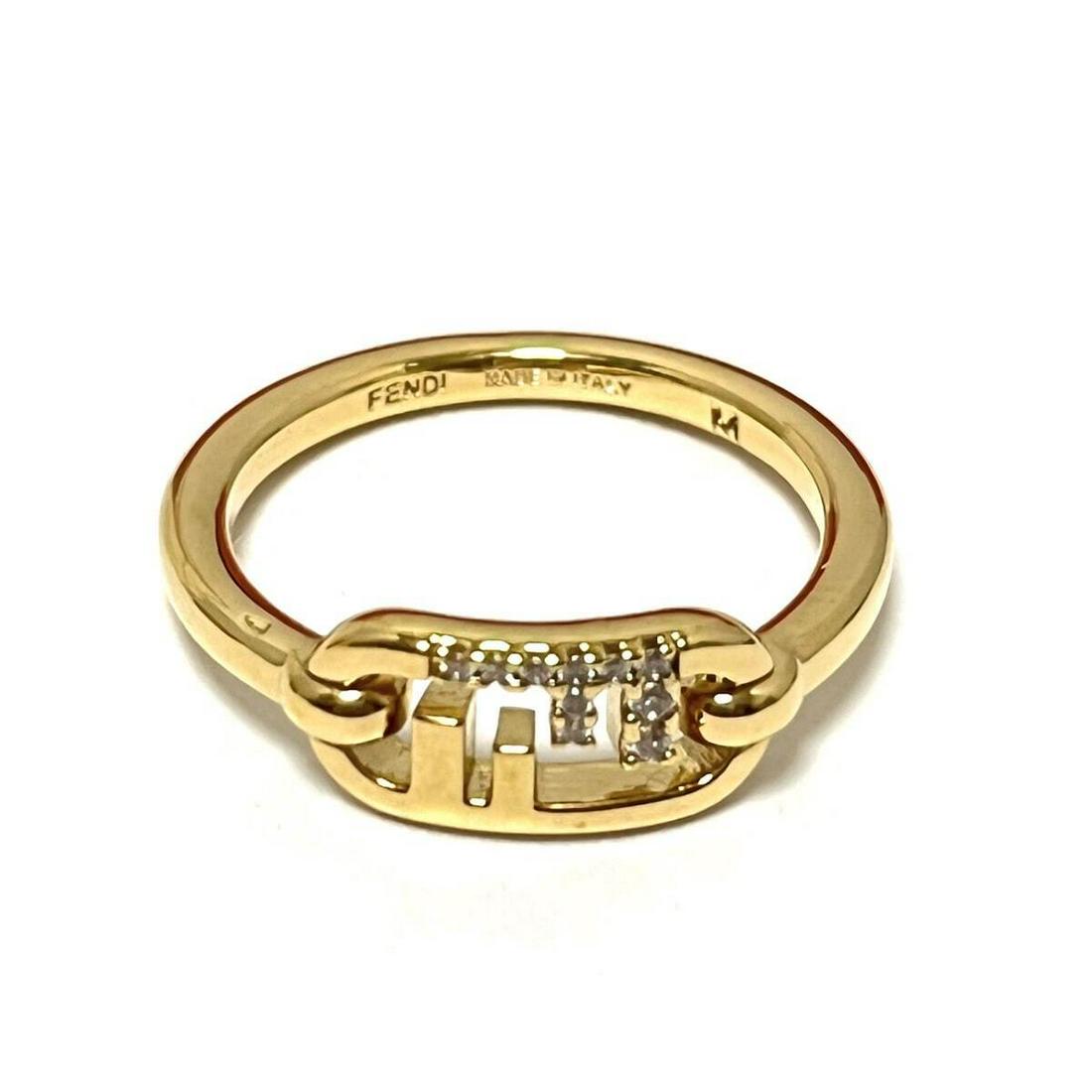FENDI Gold Clear Hardware Rhinestones Ring #12 #US6: FENDI Gold Clear Hardware Rhinestones Ring #12 #US6 Brand: FENDI Style: Ring Color: Gold Clear Material: Hardware Rhinestones Accessories: Case Type: Ring Ring Size: 12 B: Reasonable Wear and Tear The
