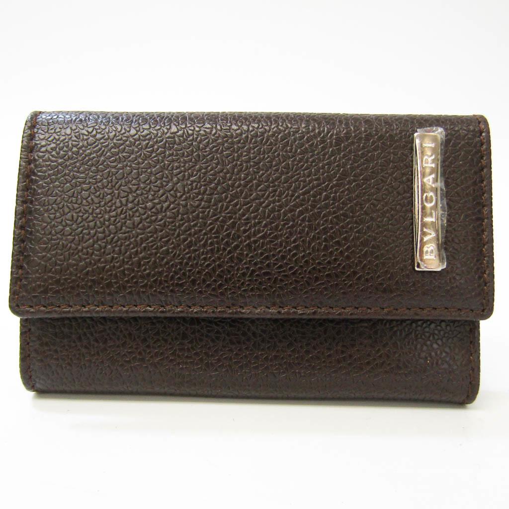 Bvlgari Unisex Leather Key Case Dark Brown: Bvlgari Unisex Leather Key Case Dark Brown Brand: Bvlgari Country of Origin: Italy Type: Keycase Color: Dark brown Gender: Unisex Closure: Snap (hook) Material: Leather Leather: Number of Key Hooks: 6
