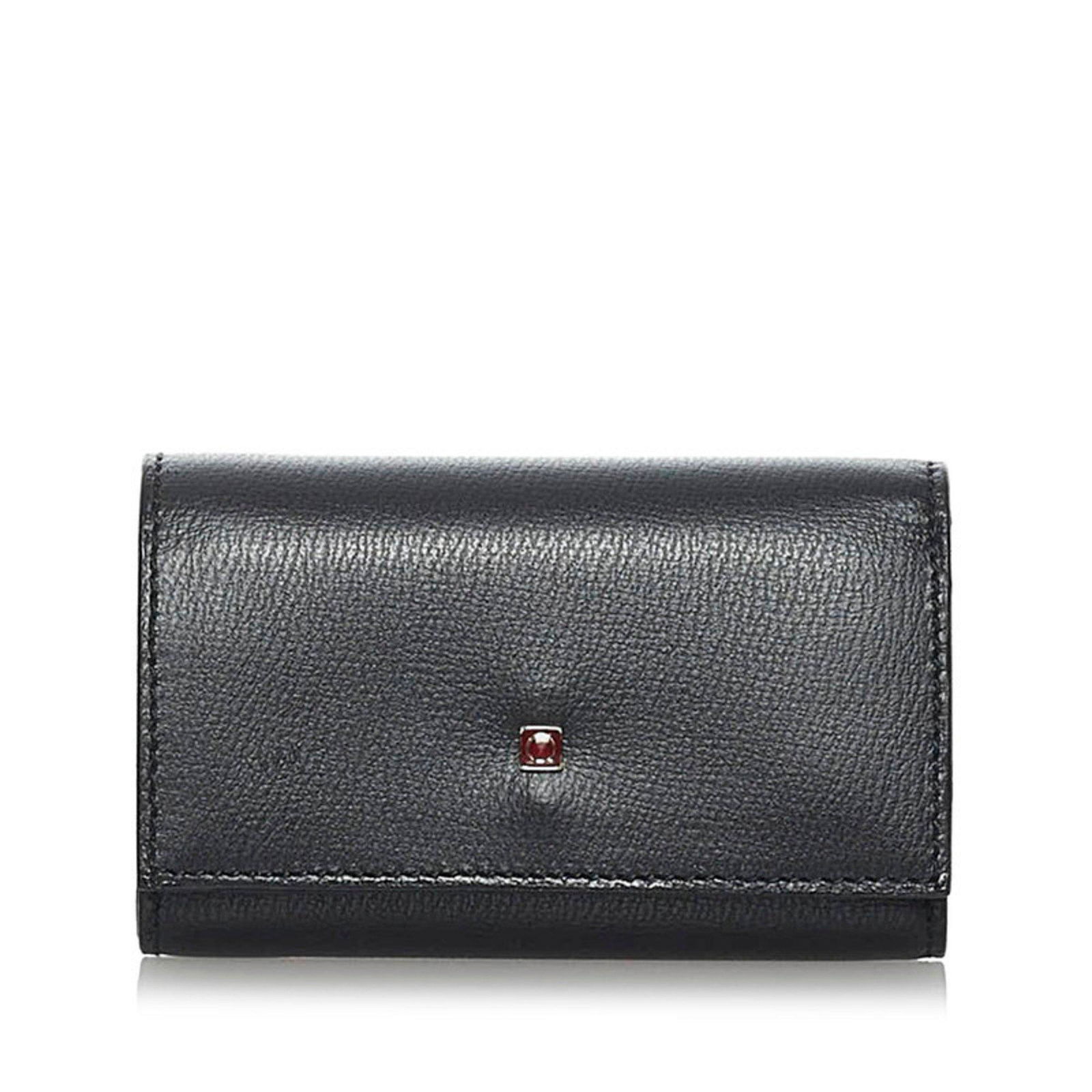 Salvatore Ferragamo Gancini 6 row key case black leather ladies: Salvatore Ferragamo Gancini 6 row key case black leather ladies Brand: Salvatore Ferragamo Line: Gancini Type: Keycase Color: Black Gender: Women Material: Leather Leather: Number of Key Hooks: 6 Size