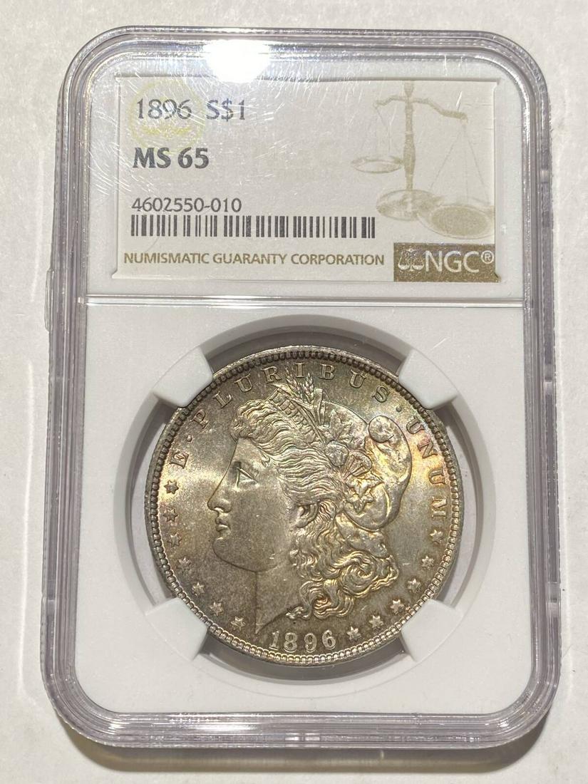 1896 P Morgan Dollar NGC MS-65 Some Rainbow Toning: 1896 P Morgan Dollar NGC MS-65 Some Rainbow Toning Certification: NGC Composition: Silver Grade: MS-65 Year: 1896 Circulated/Uncirculated: Uncirculated Strike Type: MS Mint Location: Philadelphia Coun