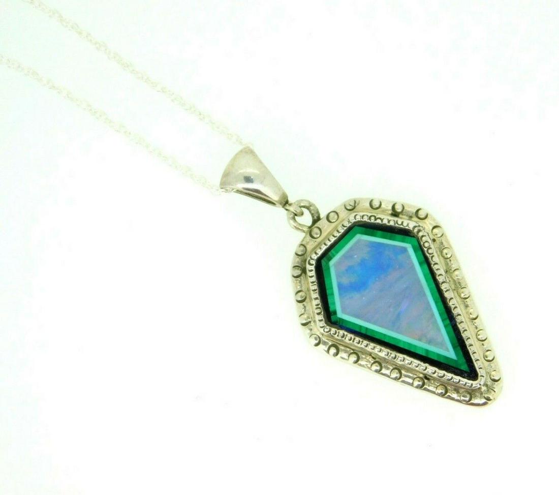 Sterling Silver Pendant Opal Inlay with Malachite and Onyx: Sterling Silver Pendant Opal Inlay with Malachite and Onyx Base Metal: Sterling Silver Main Stone Color: Multicolor Metal: Sterling Silver Item Length: 18 in Vintage: No Material: Metal Main Stone: Op