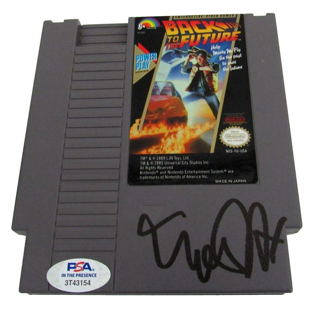 Michael J Fox Signed/Auto Back to the Future Nintendo Video Game PSA/DNA 165465: Michael J Fox Signed/Auto Back to the Future Nintendo Video Game PSA/DNA 165465 Industry: Movies Original/Reproduction: Original Autograph Authentication: PSA/DNA Pre-Owned PLEASE NOTE: Framed Large o