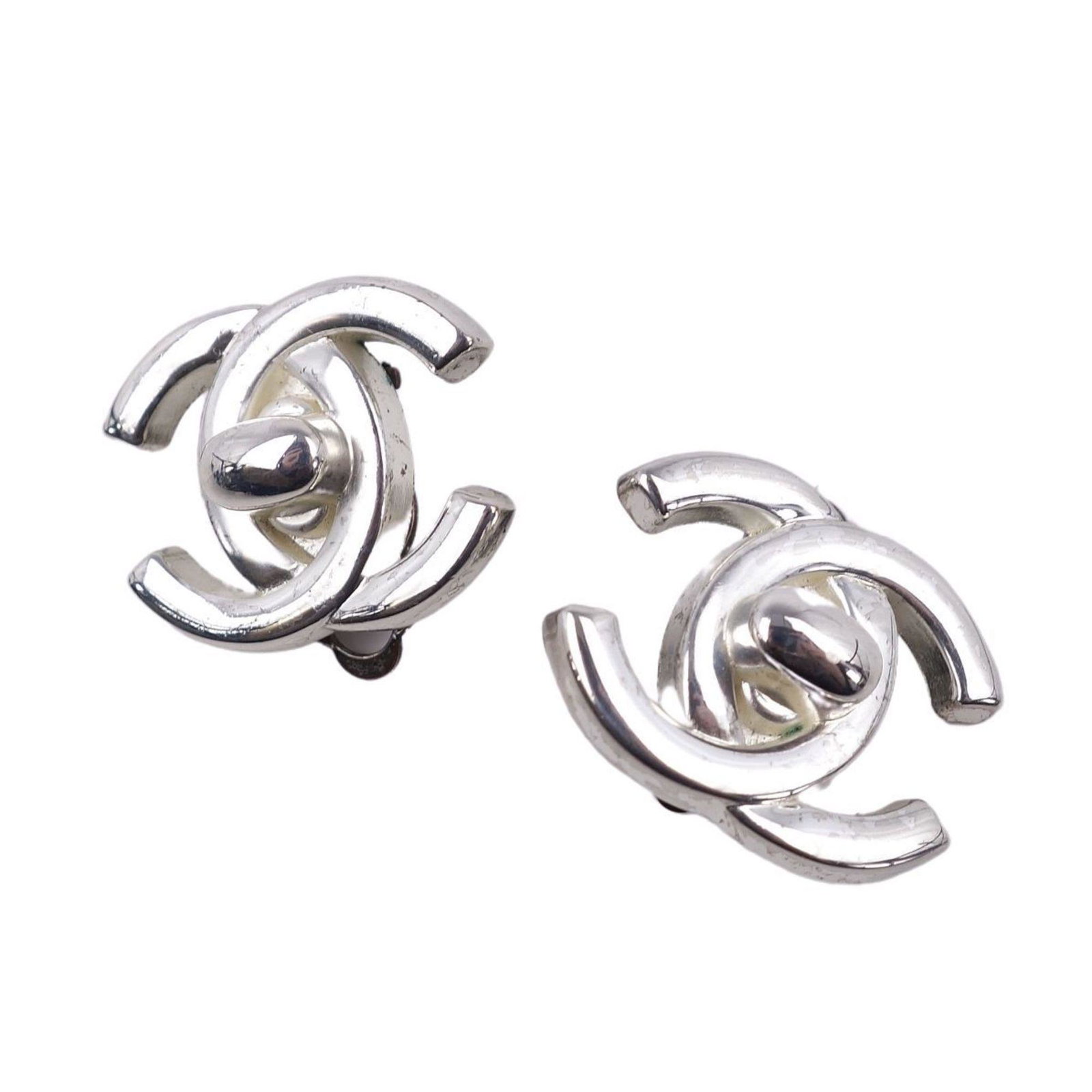 Chanel CHANEL Earrings 96A Coco Mark Turnlock Women's Silver: Chanel CHANEL Earrings 96A Coco Mark Turnlock Women's Silver Brand: Chanel Material: Metal Color: Silver Condition: Used (good) The Mynt Guarantee: All items in this auction are guaranteed to be 100% 