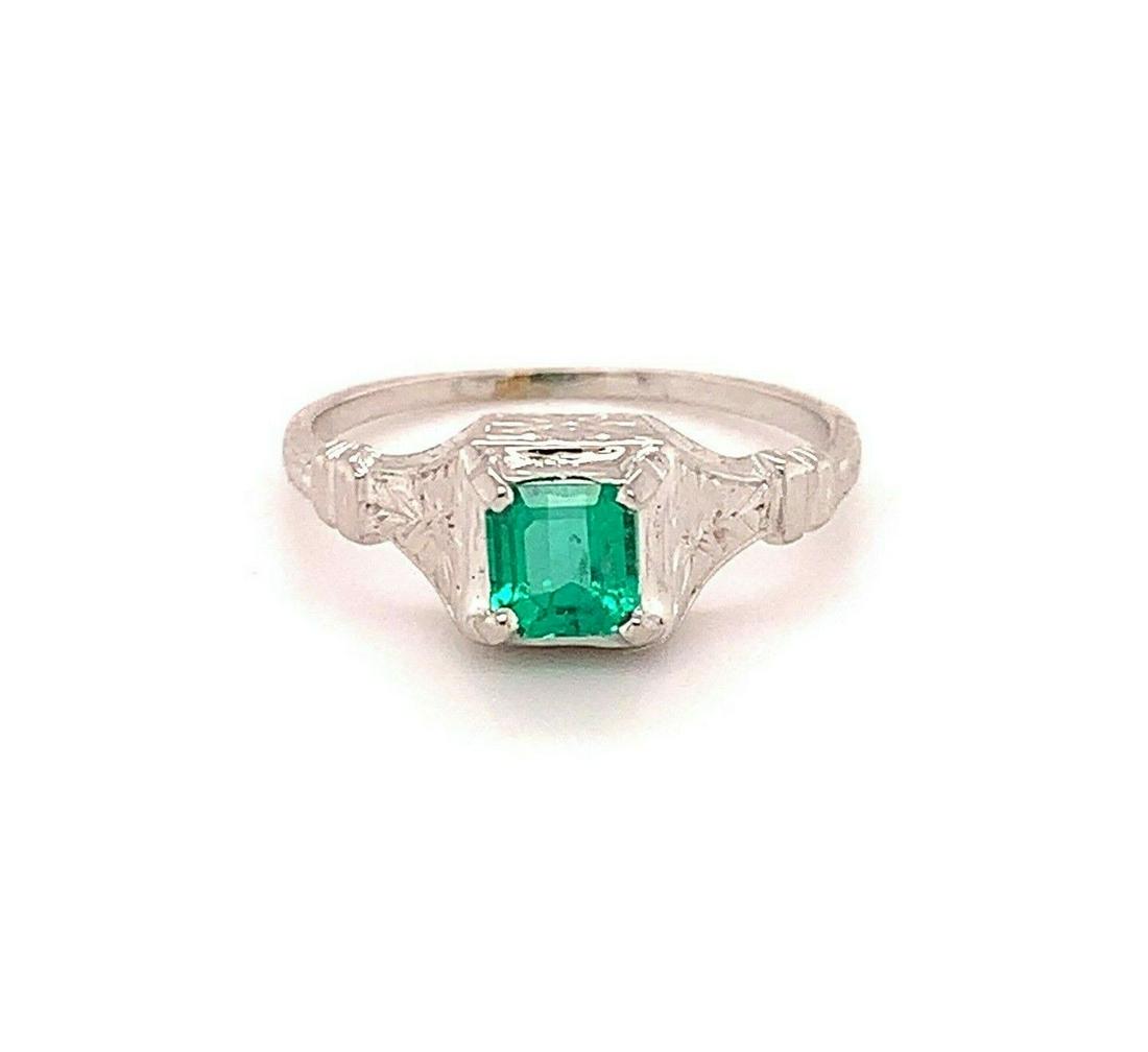 18k Gold Art Deco .56ct Genuine Natural Emerald Ring w/Engraved Flowers: 18k Gold Art Deco .56ct Genuine Natural Emerald Ring w/Engraved Flowers Features: Engraved Base Metal: Gold Main Stone Color: Green Metal: White Gold Main Stone Shape: Square Vintage: Yes Material: Me