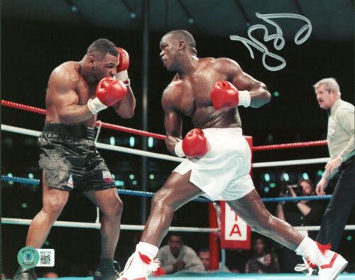 Buster Douglas Signed 8x10 Vs Mike Tyson Horizontal Photo BAS Witness: Buster Douglas Signed 8x10 Vs Mike Tyson Horizontal Photo BAS Witness Sport: Boxing Product: Glove Original/Reprint: Original Player: Buster Douglas Autograph Authentication: Beckett Product Coa: Beck