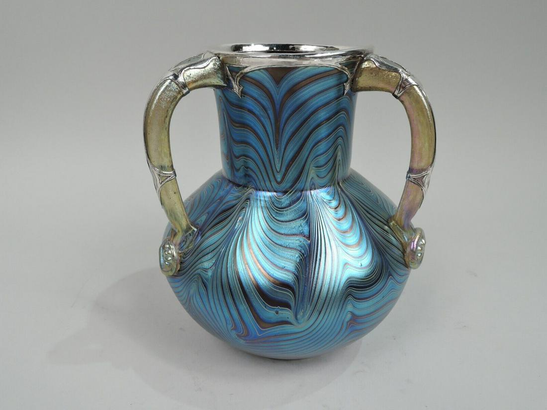 Loetz Vase Antique Art Nouveau Austrian Iridescent Blue Glass Silver Overlay: Loetz Vase Antique Art Nouveau Austrian Iridescent Blue Glass Silver Overlay Brand: Loetz Type: Vase Style: Art Nouveau Age: 1850-1899 Striking turn-of-the-century Art Nouveau glass vase by historic L
