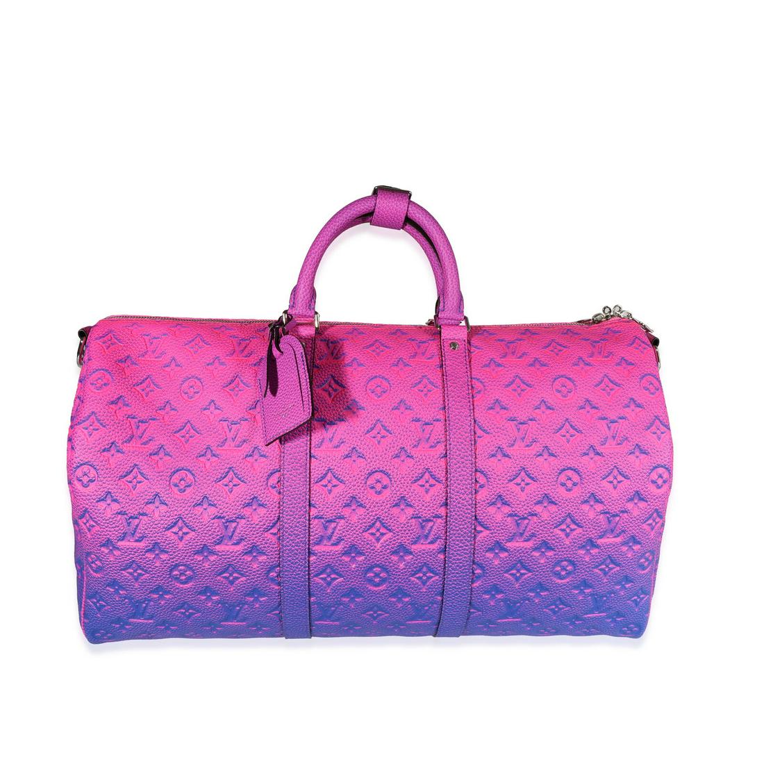 Louis Vuitton Pink & Blue Monogram Taurillon Illusion Keepall Bandouliere 50: Louis Vuitton Pink & Blue Monogram Taurillon Illusion Keepall Bandouliere 50 Dimensions: 22.5 x 13.5 x 9 Handbag Accessories: Additional Strap;Dustbag;ID Tag;Lock;Key Bag Length: 22.5 in Bag Depth: 9 