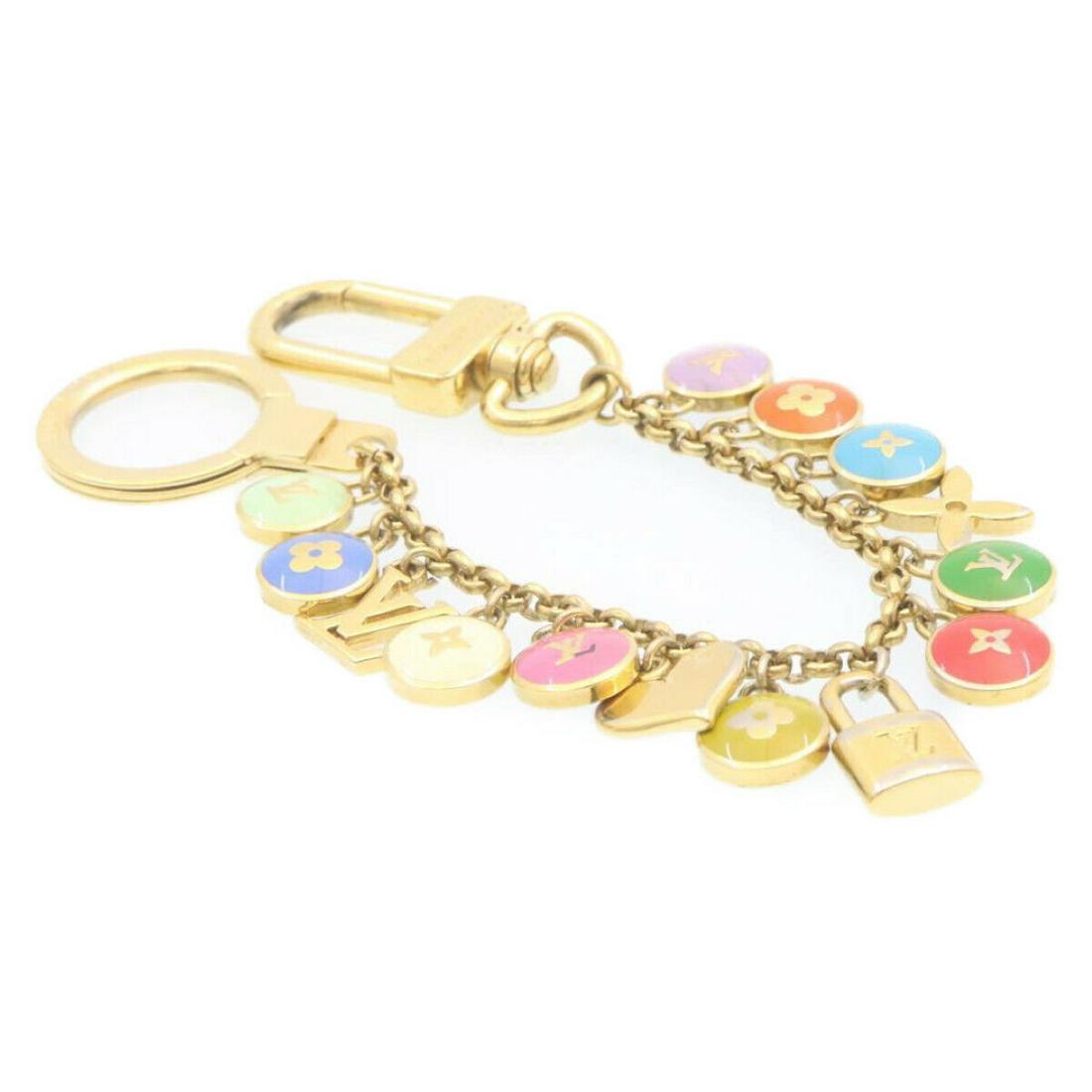 LOUIS VUITTON Porte Cles Cianne Pastilles Bag Charm Chain M65386 LV: LOUIS VUITTON Porte Cles Cianne Pastilles Bag Charm Chain M65386 LV Brand: LOUIS VUITTON Type: unknown Color: unknown B: Reasonable Wear and Tear The Mynt Guarantee: All items in this auction are guar