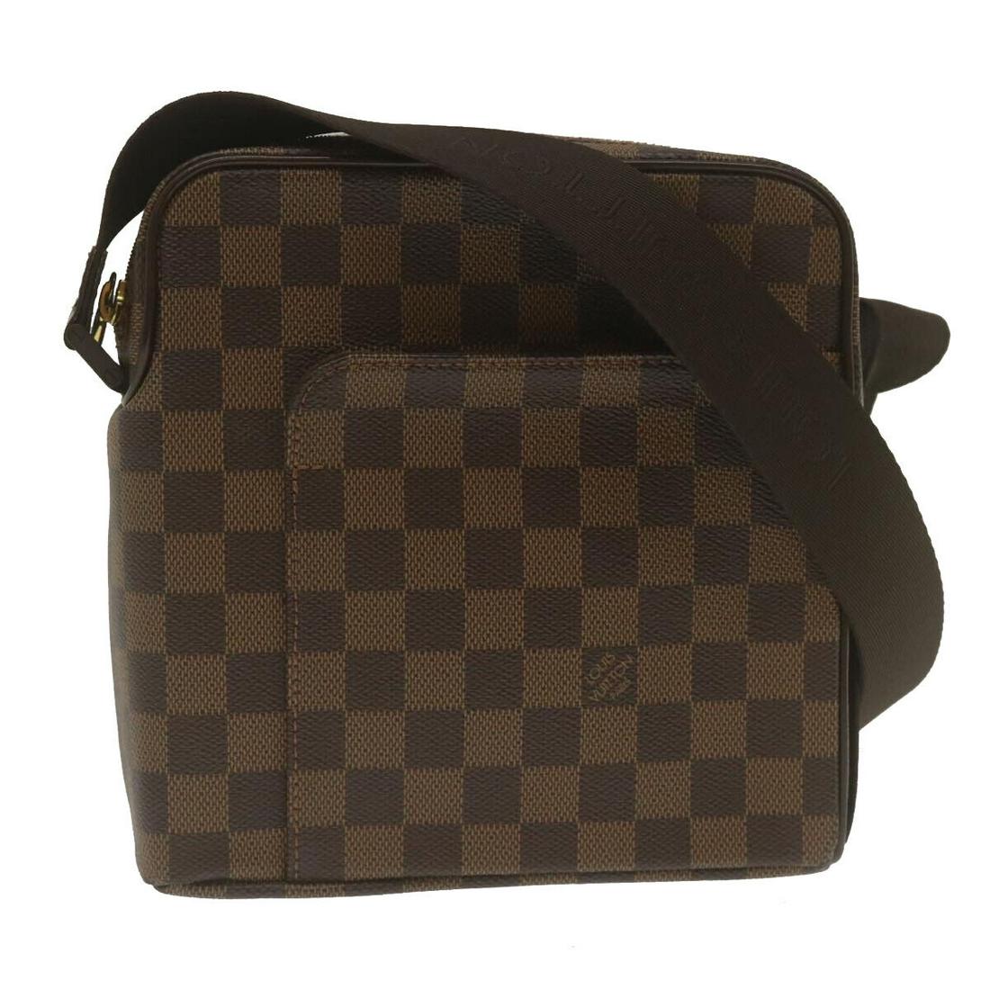 LOUIS VUITTON Damier Ebene Olaf PM Shoulder Bag N41442 LV: LOUIS VUITTON Damier Ebene Olaf PM Shoulder Bag N41442 LV Brand: LOUIS VUITTON Style: Shoulder Bag Exterior Material: Damier Ebene Canvas Exterior Color: Damie Ebene Bag Height: 7.9inch(Approx) / 20cm