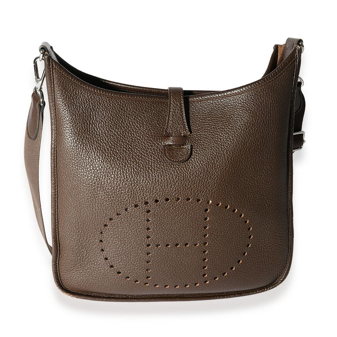 Hermes Chocolat Clemence Evelyne III 29 PHW: Hermes Chocolat Clemence Evelyne III 29 PHW Dimensions: 12.25 x 12 x 3.5 Handbag Accessories: Dustbag Bag Length: 12.25 in Bag Depth: 3.5 in Bag Height: 12 in Style: Shoulder Bag Material: Leather Col
