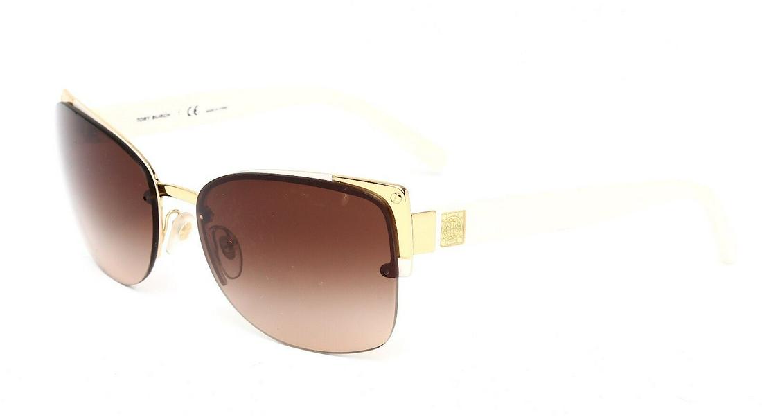 Tory Burch TY6034 Women's White Gold Sunglasses 2988: Tory Burch TY6034 Women's White Gold Sunglasses 2988 Character: Tori Color: White / Gold Brand: Tory Burch Frame Color: Gold Type: Sunglasses Eye Size: 58mm Model: Tory Burch TY6034 Style: Sunglasses