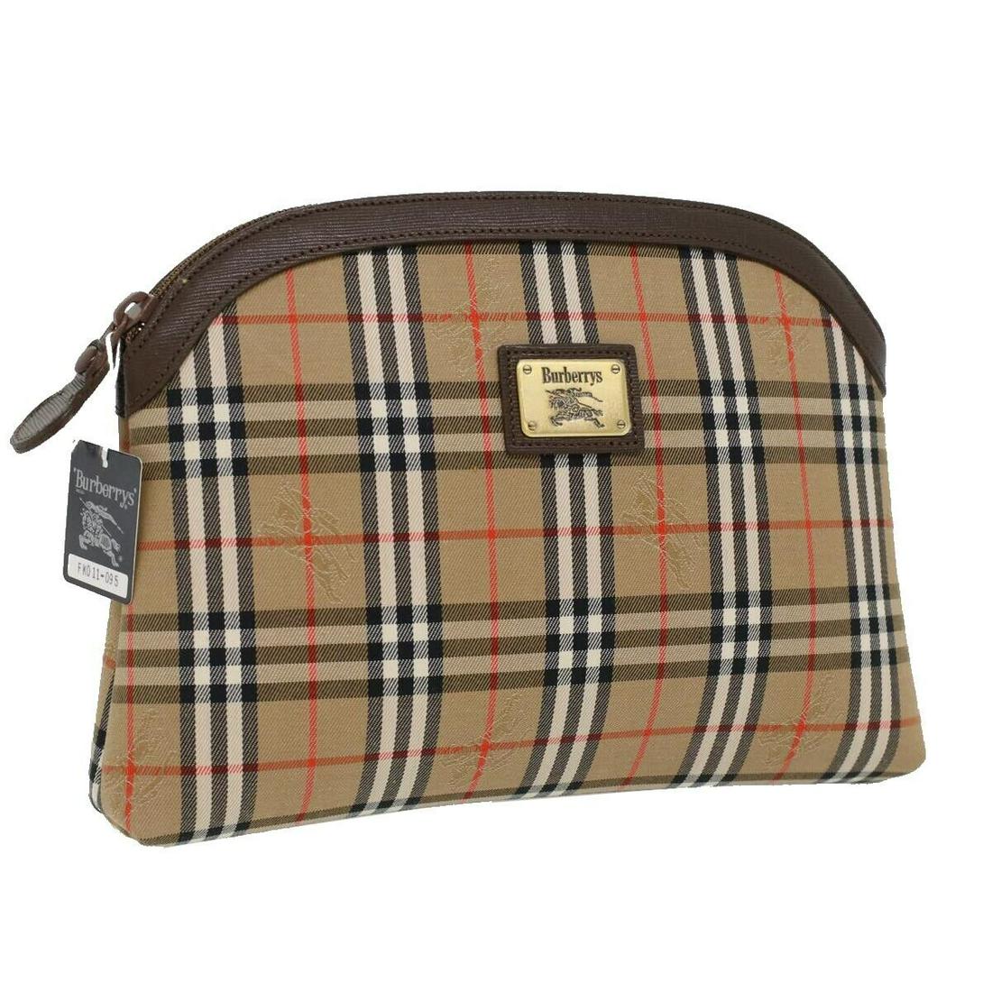 Burberrys Nova Check Clutch Bag Beige: Burberrys Nova Check Clutch Bag Beige Brand: Burberrys Style: Clutch Bag Material: Canvas Exterior Color: Beige Bag Height: 6.7inch(Approx) / 17cm(Approx) Bag Depth: 2.0inch(Approx) / 5cm(Approx) Bag