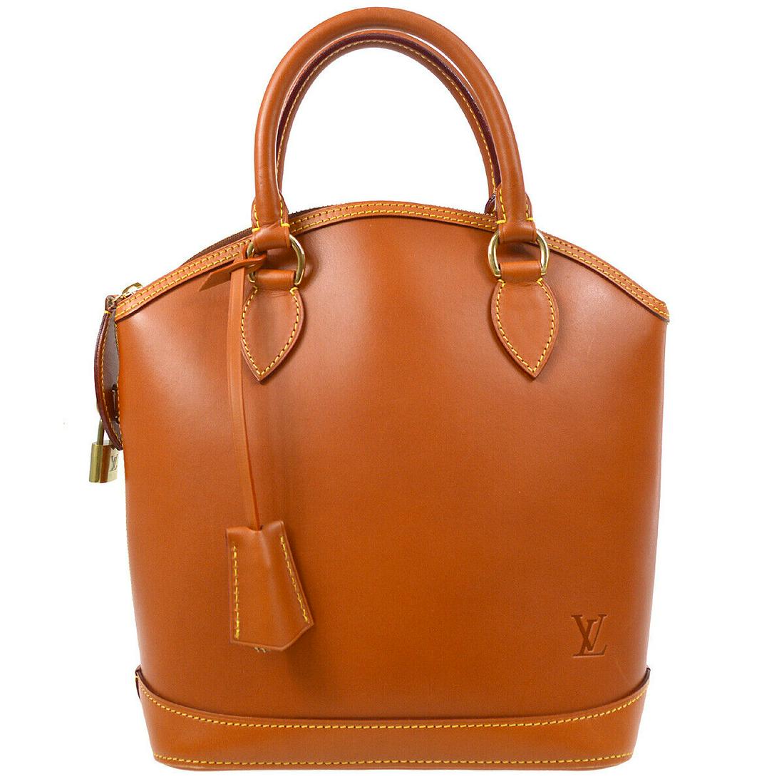 LOUIS VUITTON LOCKIT HAND BAG PURSE AS1006 NOMADE LEATHER CARAMEL M85388: LOUIS VUITTON LOCKIT HAND BAG PURSE AS1006 NOMADE LEATHER CARAMEL M85388 Size: Medium Accents: Logo Model: MONOGRAM Nomade Style: Hand Bag Handle Style: Double Handles Bag Height: 11.2 Product Line: L