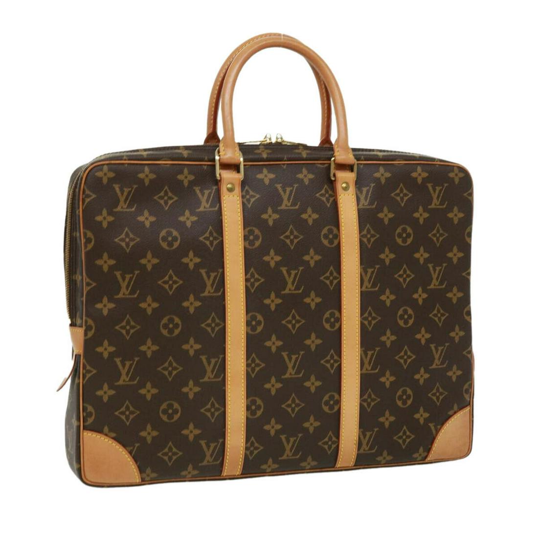 LOUIS VUITTON Monogram Porte Documents Voyage Business Bag M52005 LV: LOUIS VUITTON Monogram Porte Documents Voyage Business Bag M52005 LV Brand: LOUIS VUITTON Material: Monogram Canvas Exterior Color: Monogram Bag Height: 11.4inch(Approx) / 29cm(Approx) Bag Depth: 2.4i