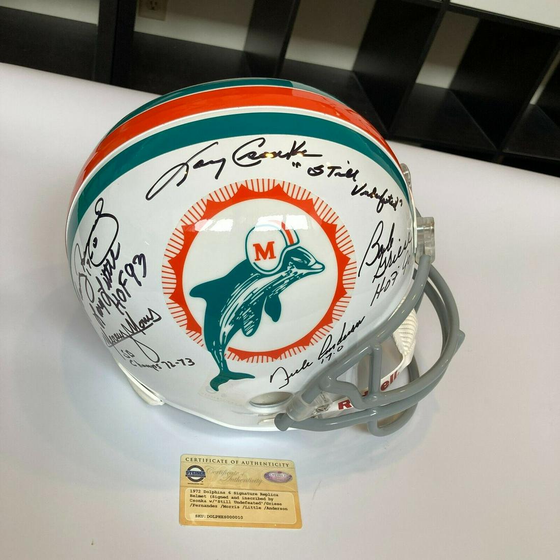 1972 Miami Dolphins Super Bowl Champs Team Signed Helmet Steiner COA: 1972 Miami Dolphins Super Bowl Champs Team Signed Helmet Steiner COA Product: Helmet Sport: Football-NFL Autograph Authentication: Steiner Sports Team: Miami Dolphins Original/Reprint: Original Pre-Ow