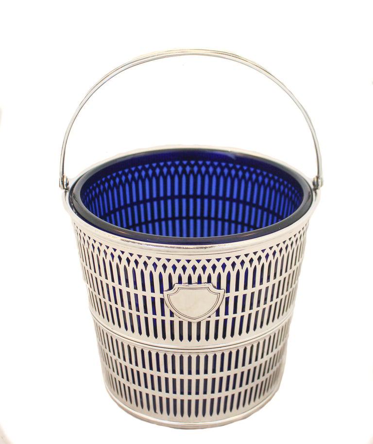 Sterling Silver Ice Bucket: Sterling Silver Ice Bucket Creator: Wallace Silversmiths (Manufacturer) Dimensions: Height: 5 in (12.7 cm) Dimensions: Diameter: 5.5 in (13.97 cm) Materials and Techniques: Glass Materials and Techniq