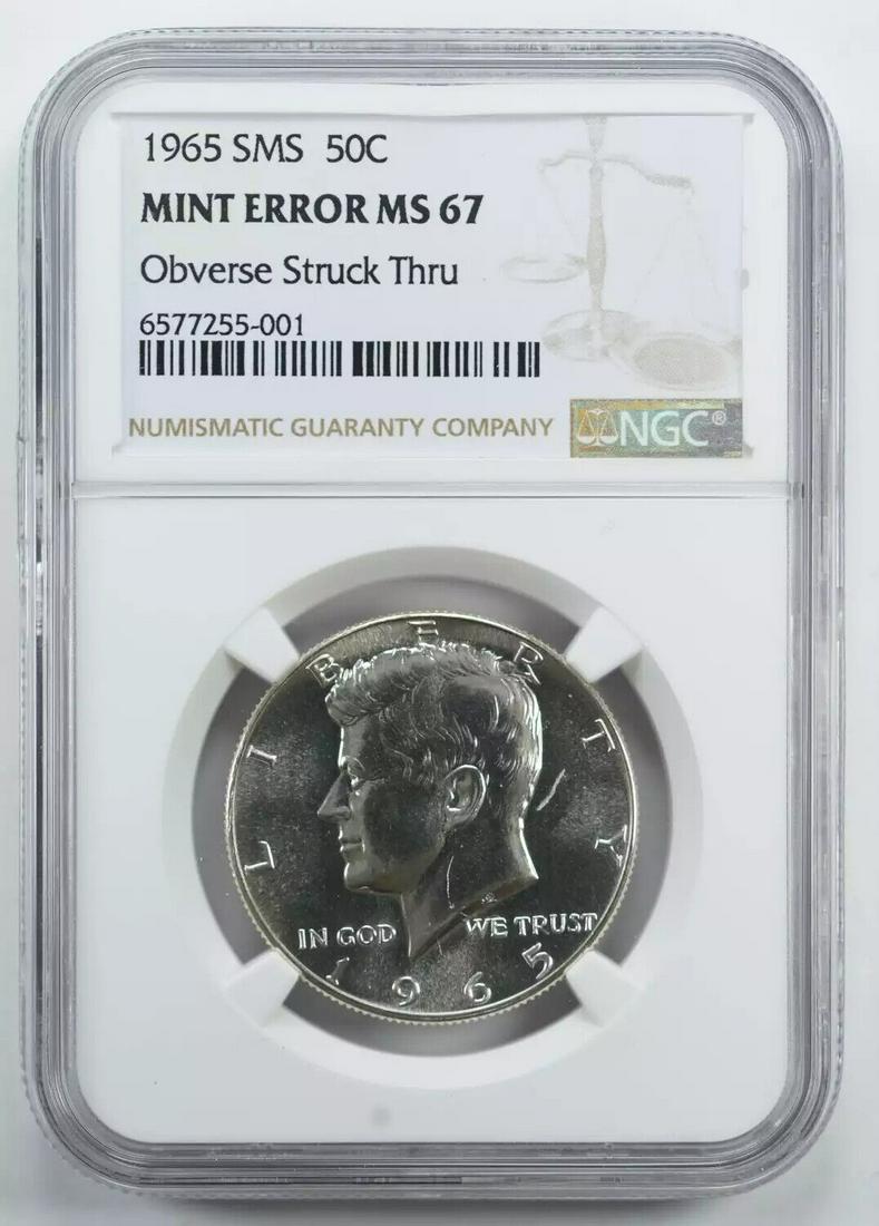 1965 SMS KENNEDY HALF DOLLAR 50C NGC MS 67 UNC - ERROR OBV STRUCK THRU (001): 1965 SMS KENNEDY HALF DOLLAR 50C NGC MS 67 UNC - ERROR OBV STRUCK THRU (001) Certification: NGC Composition: Silver Grade: MS-67 Year: 1965 Circulated/Uncirculated: Uncirculated Strike Type: MS Mint L