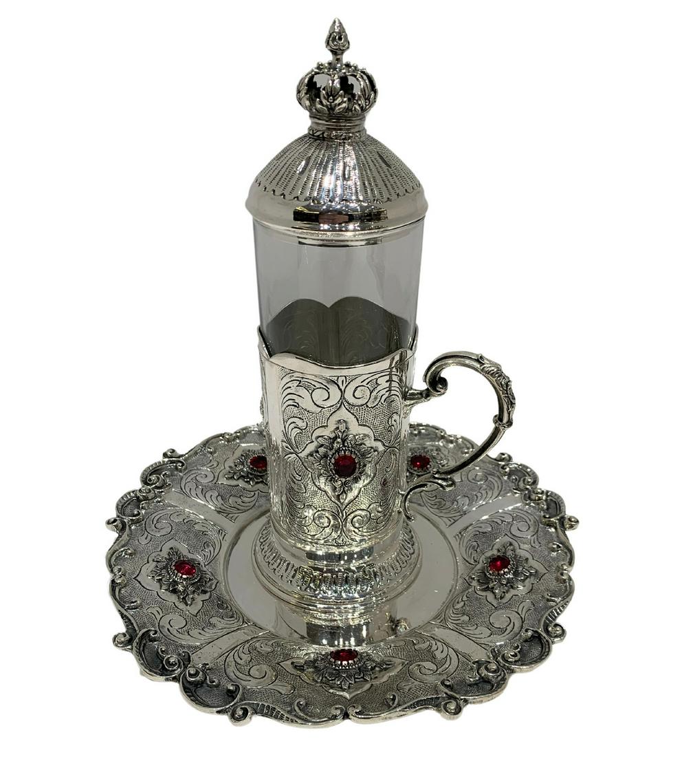 FINE 925 STERLING SILVER & GLASS & RED STONE HANDMADE CHASED TEA CUP & TRAY: FINE 925 STERLING SILVER & GLASS & RED STONE HANDMADE CHASED TEA CUP & TRAY Composition: Sterling Silver Maker: Made in Turkey Fine 925 Sterling Silver Tea Cup with Handle & Tray. Featuring handmade c