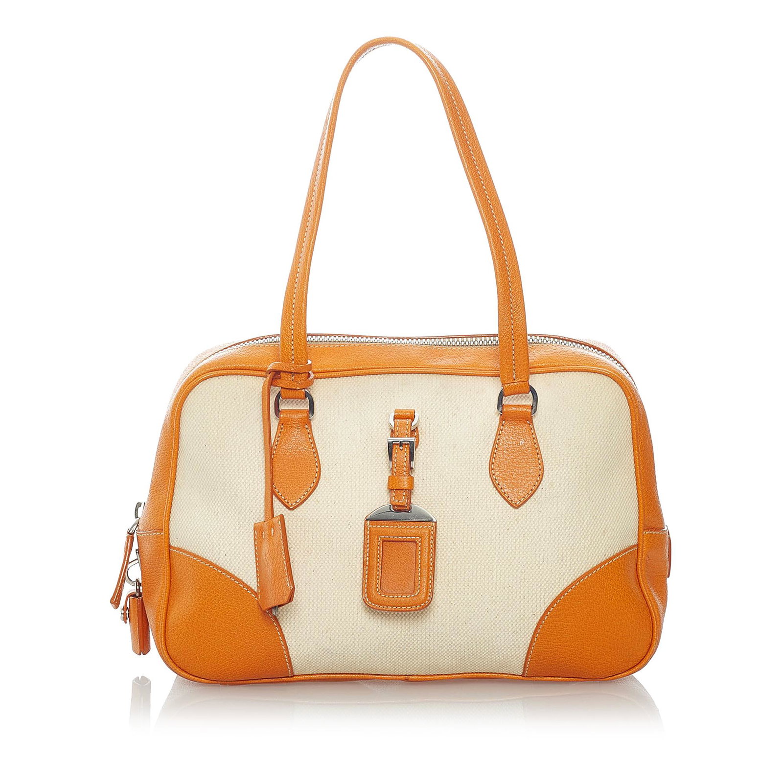 Prada Canvas Shoulder Bag: Prada Canvas Shoulder Bag This shoulder features a canvas body flat handles an top zip closure and interior zip and slip pockets. Brand: Prada Model: Canvas Shoulder Bag Origin: Italy Category: Bags C