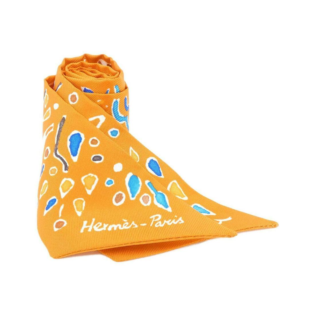 HERMES ISORA DI PRIMAVERA Twilly 063755S Scarf: HERMES ISORA DI PRIMAVERA Twilly 063755S Scarf Brand: HERMES Style: Scarf Color: POTIRON+BLUE+TABAC Material: silk Gender: Unisex Size: W x H 86cmx5cm Type: Scarf A: Excellent The MYNT Guarantee: All