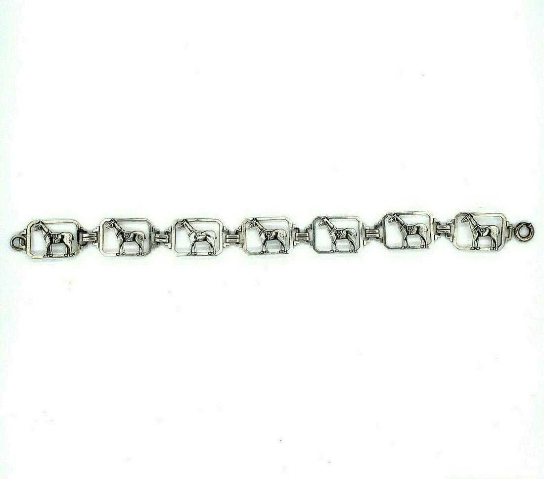 Vintage Sterling Saddled Horse Bracelet: Vintage Sterling Saddled Horse Bracelet (#J5482) All of our jewelry is guaranteed authentic by our graduate gemologist of the gemological institute of america (gia). Vintage sterling saddled horse bra