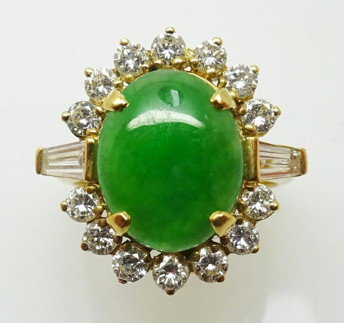 18k Gold Oval Jade Ring with .33ct Diamonds: 18k Gold Oval Jade Ring with .33ct Diamonds (#J3453) All of our jewelry is guaranteed authentic by our graduate gemologist of the gemological institute of america (gia). 18k gold oval jade ring with.
