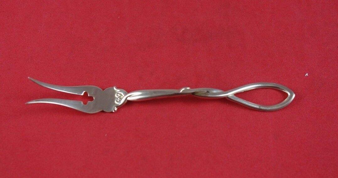 Frank Whiting Sterling Silver Lemon Fork with Loop Handle 5" Serving: Frank Whiting Sterling Silver Lemon Fork with Loop Handle 5" Serving Frank whitingfrank whiting sterling silver lemon fork with loop handle, 5". It is not monogrammed and is in excellent condition. Pr